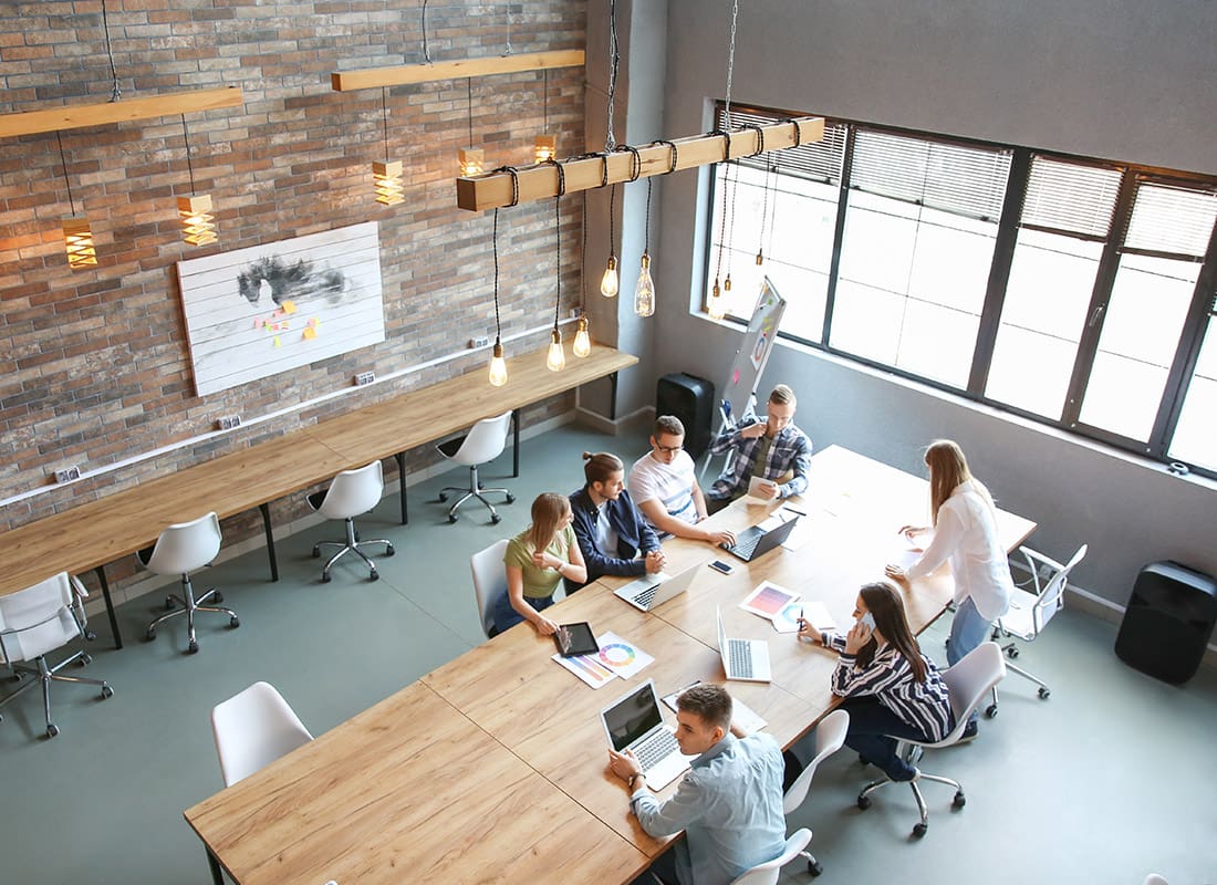 Clarksdale, MS - Overhead View of a Group of People in a Meeting